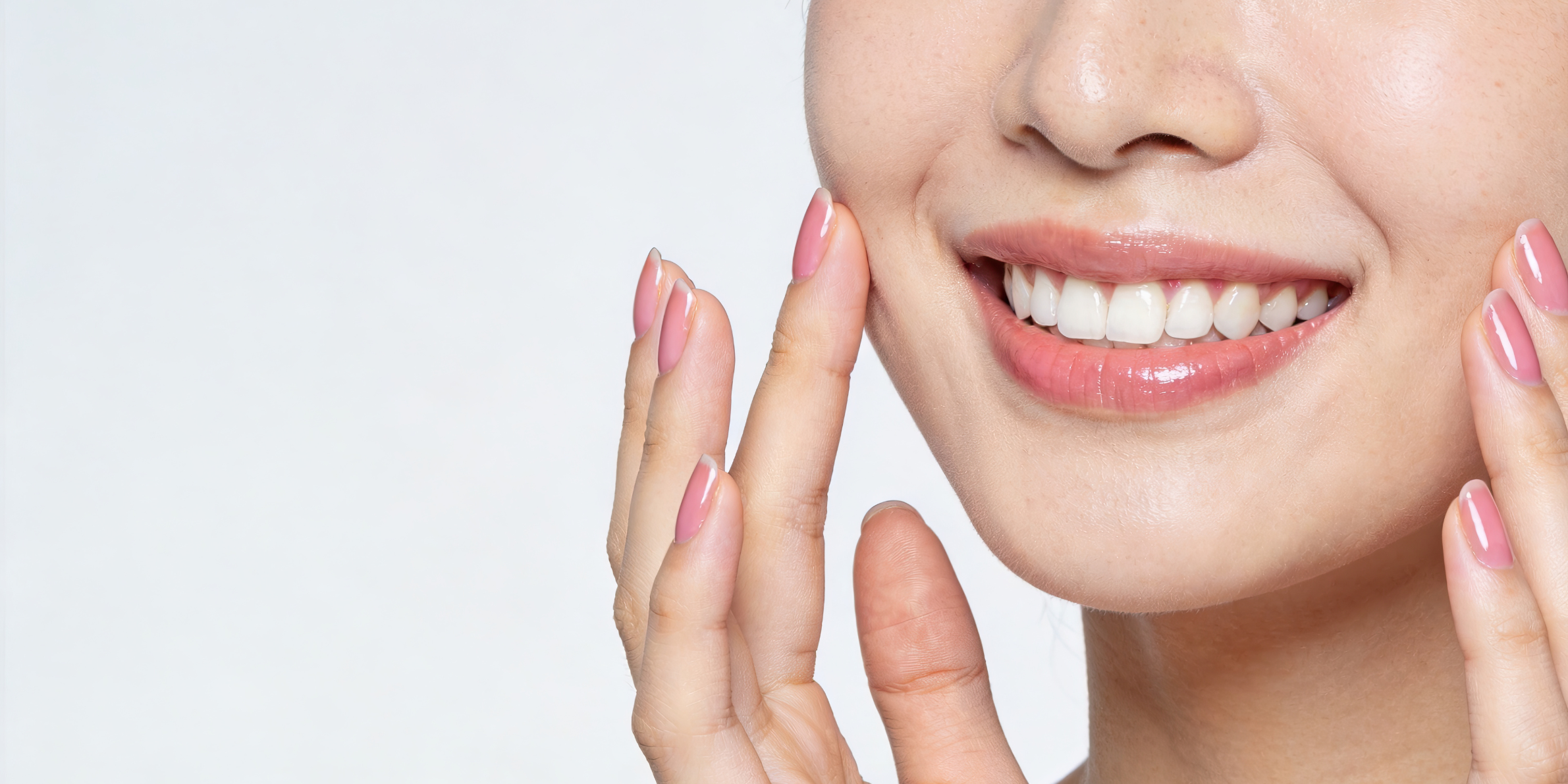 Close-up of a beautiful cosmetic smile showing the natural-looking result of porcelain veneers at Brite Clean Smiles Costa Mesa
