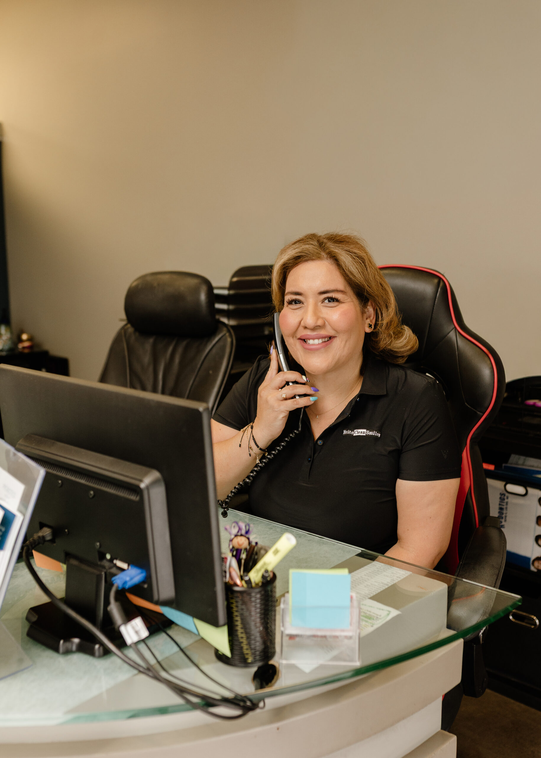 Front desk team member welcoming a patient at Brite Clean Smiles in Costa Mesa
